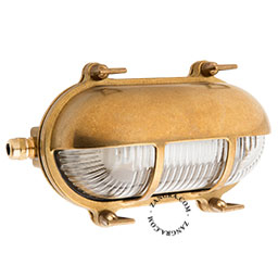 Udendørs skotlampe i rå messing.