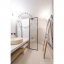 White porcelain wall light with glass globe for bathroom or outdoor use.