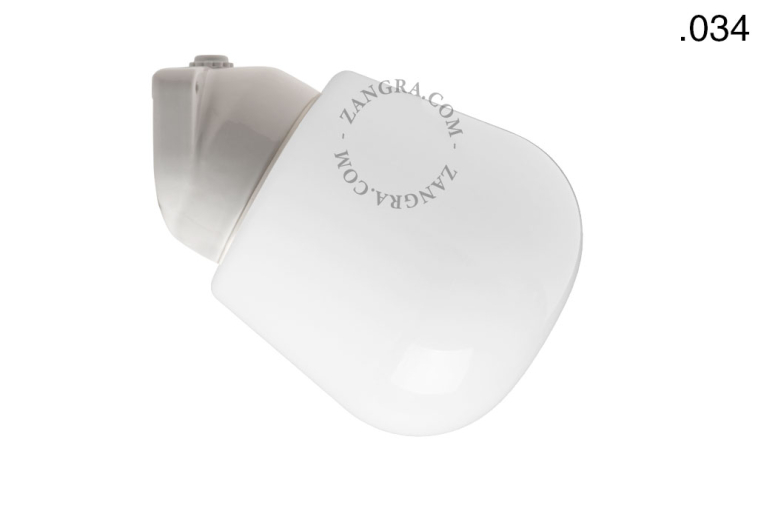 White porcelain wall light with glass globe for bathroom or outdoor use.