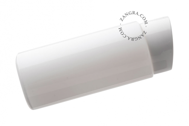 White porcelain wall light with glass globe for bathroom or outdoor use.