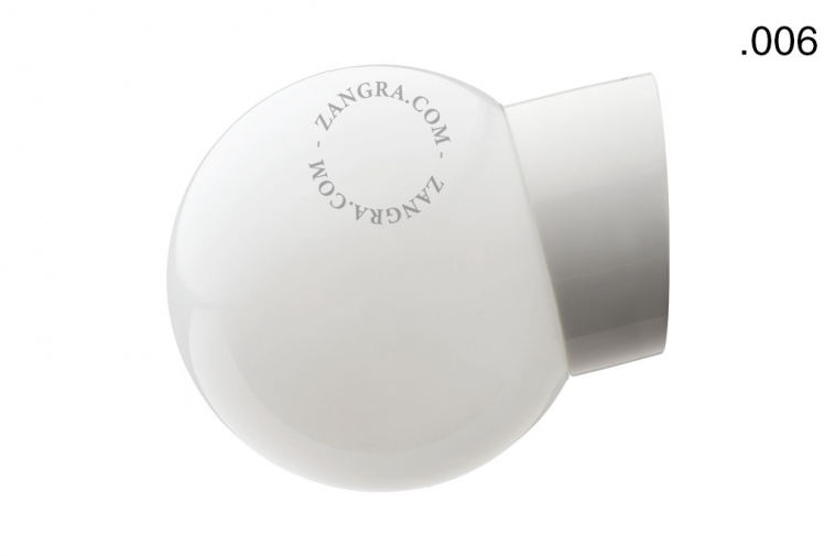 White porcelain wall light with glass globe for bathroom or outdoor use.