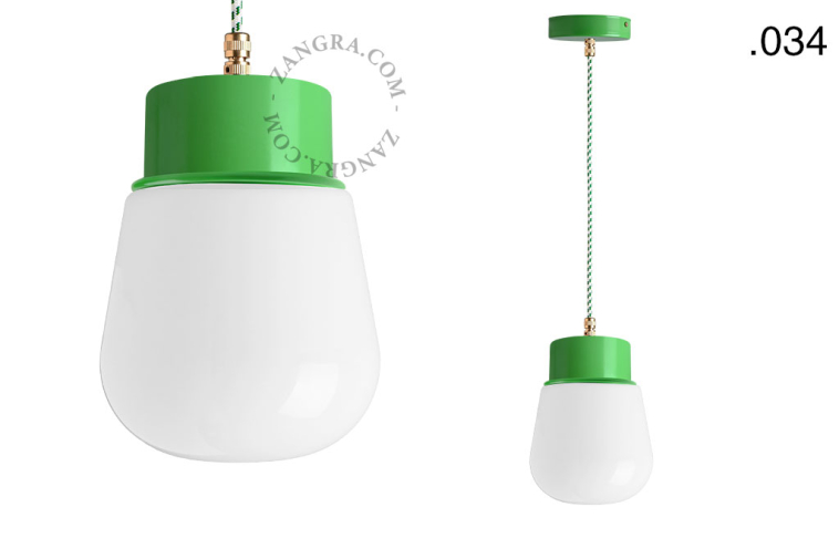 Green pendant light with glass shade.