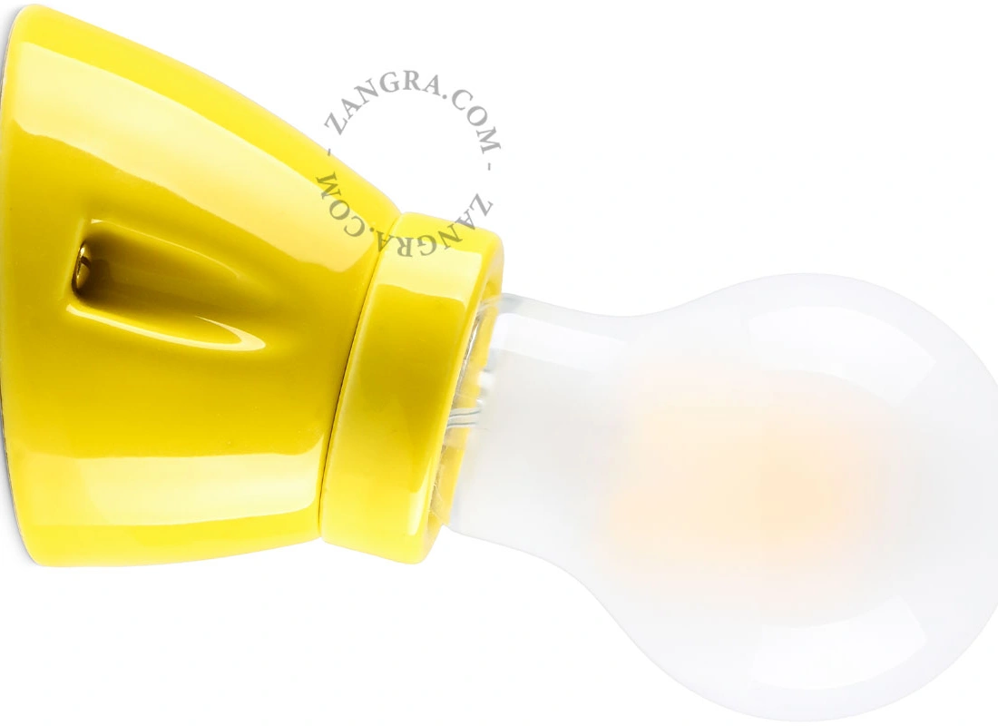porcelanowa lampa ścienna żółta