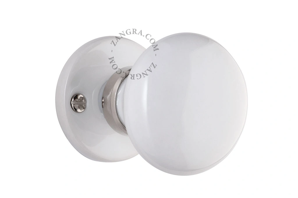 white porcelain double doorknob