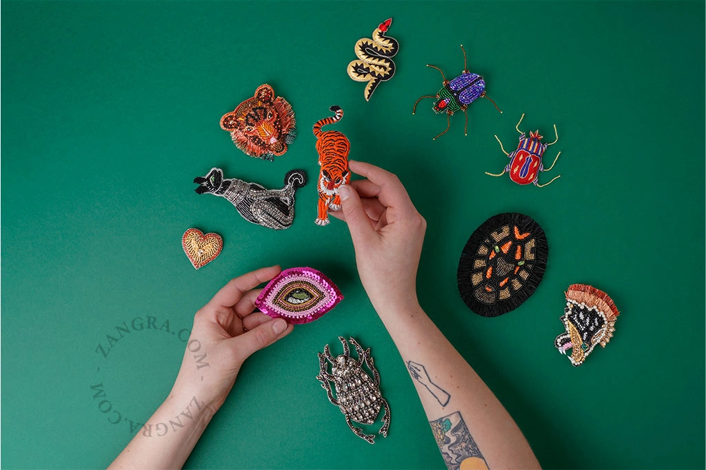 broche cabeza de león