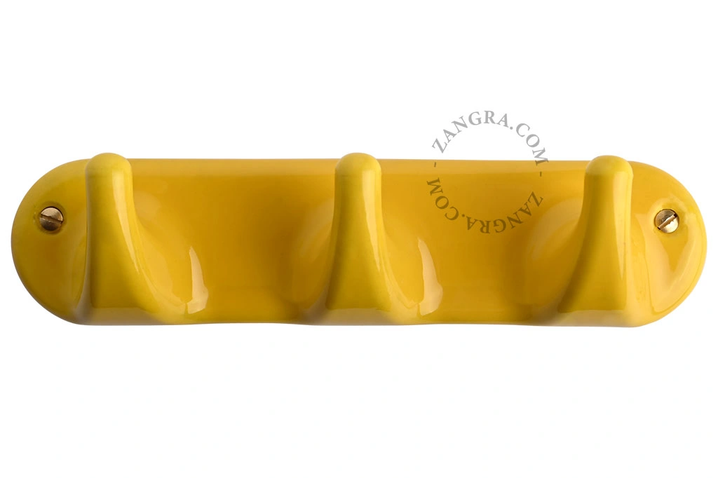 yellow porcelain hook