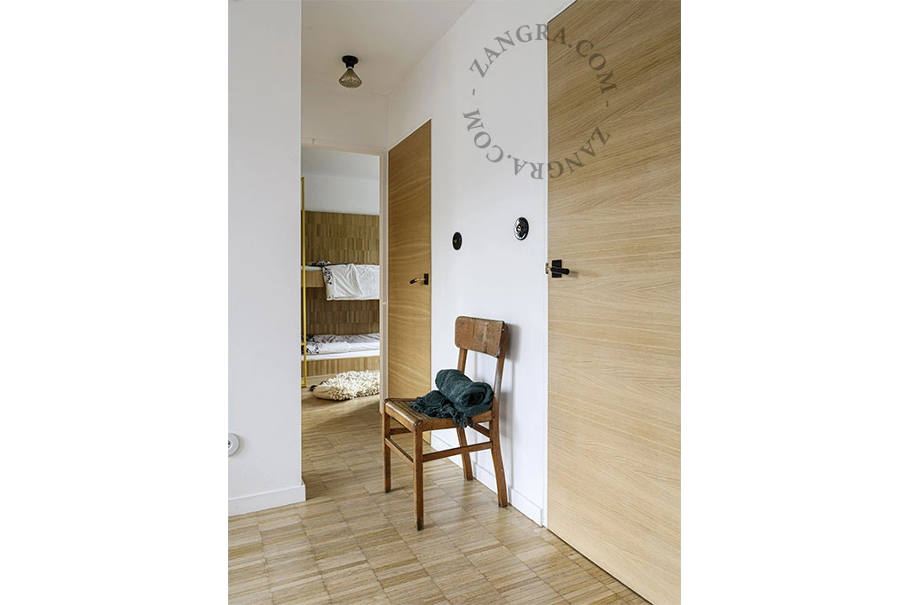 black porcelain and brass double door handle