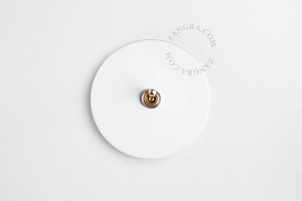 interrupteur en porcelaine blanche va-et-vient ou simple - levier en laiton