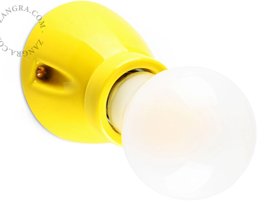 porcelanowa lampa ścienna żółta