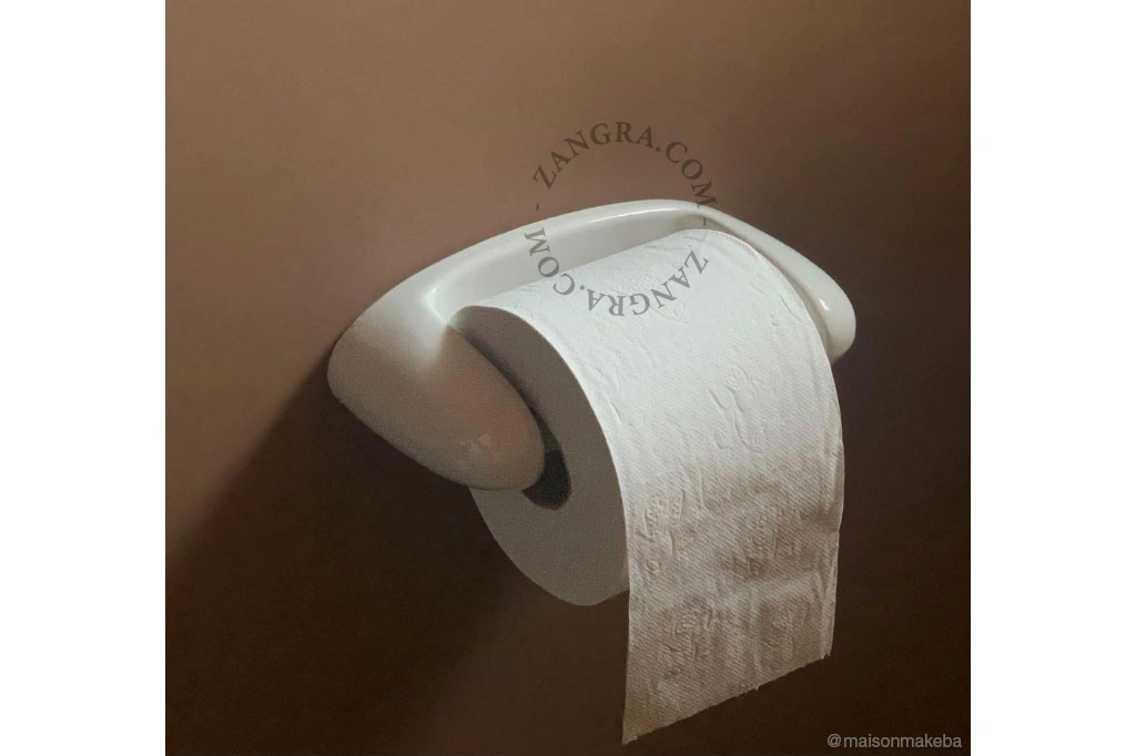 white porcelain toilet paper holder