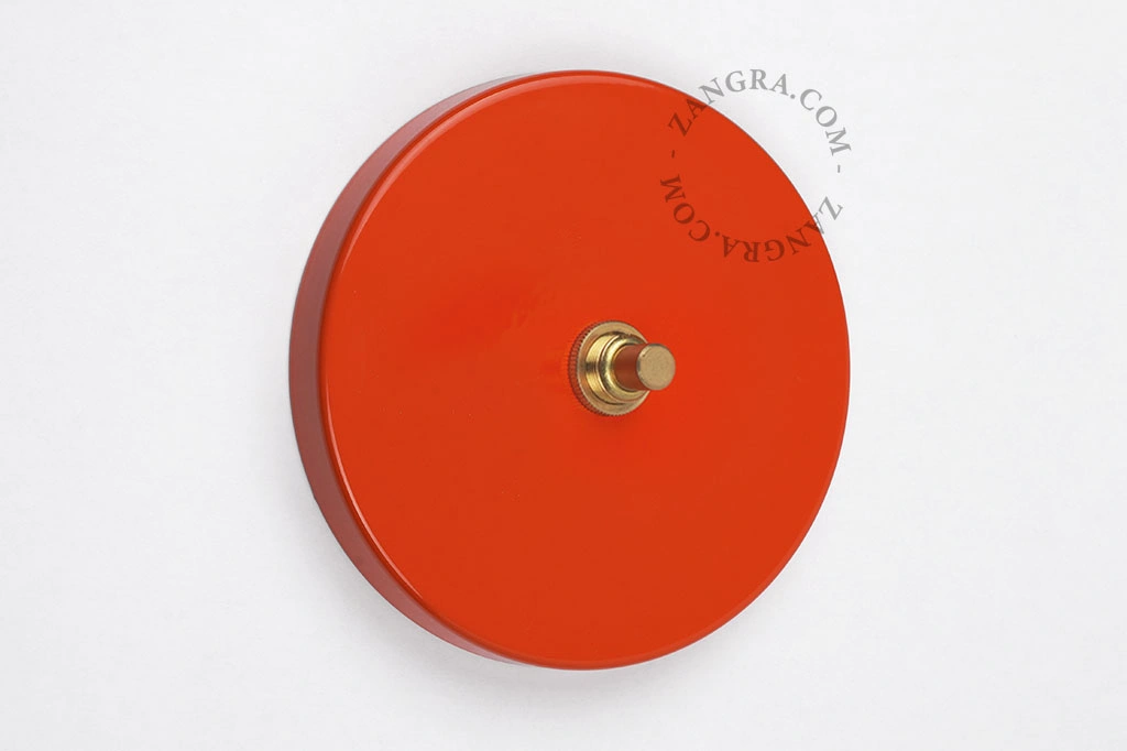 interruttore rosso - pulsante in ottone