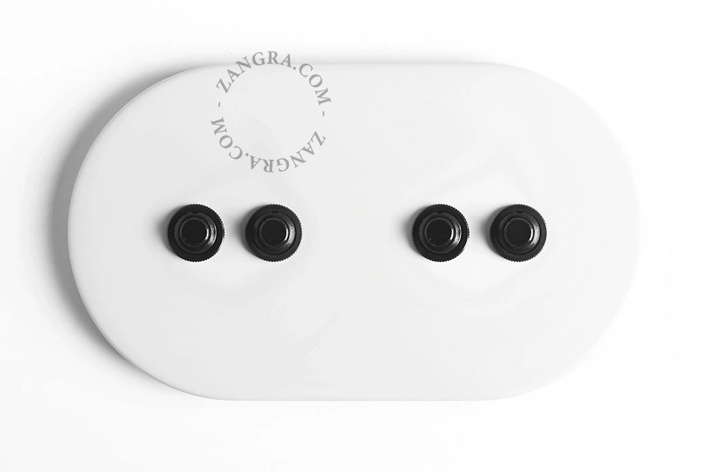 witte schakelaar met 4 zwarte drukknoppen
