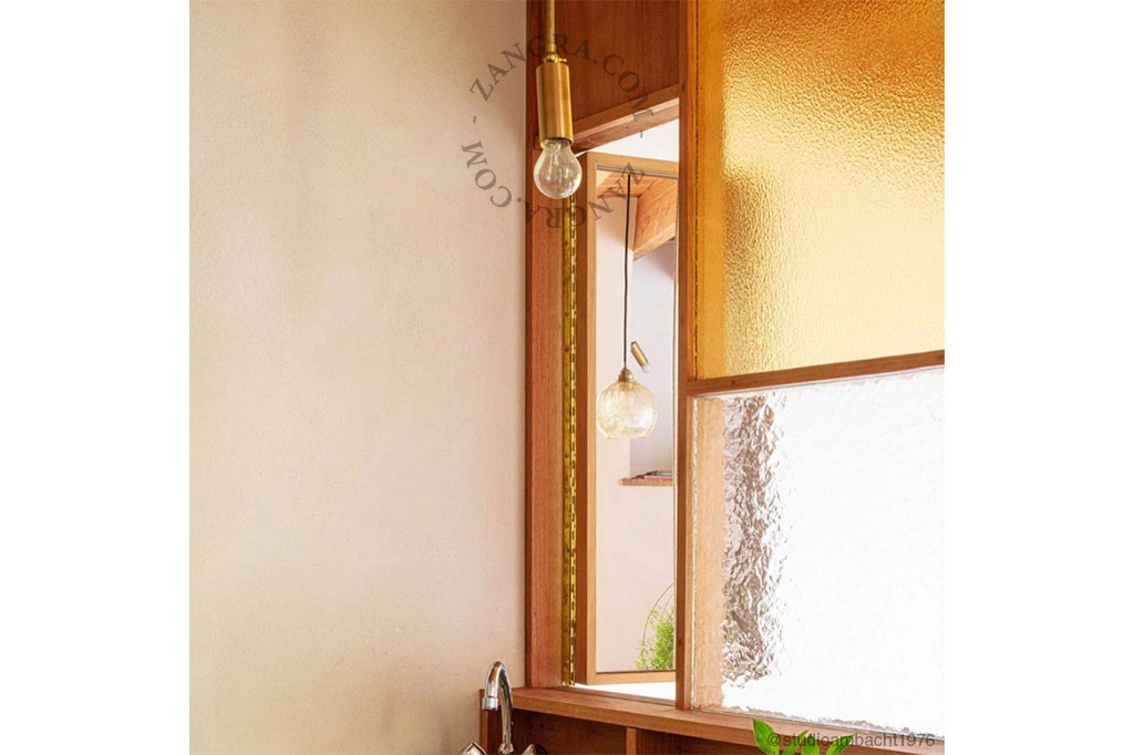 mosiężna lampa wisząca