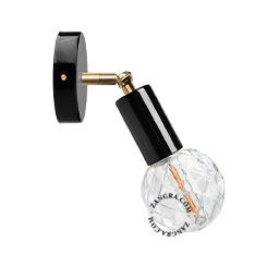 black adjustable wall light with brass arm