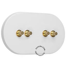 witte schakelaar met 4 goudkleurige drukknoppen