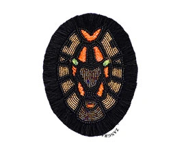 broche cabeza de león