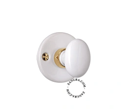 white porcelain and brass rosette and thumb turn lock