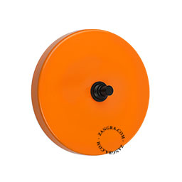 interrupteur orange avec bouton-poussoir en laiton noir