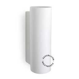 Cylindrical up & down wall light in white ceramic.