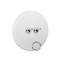 Matte white porcelain switch with double nickel-plated toggle.