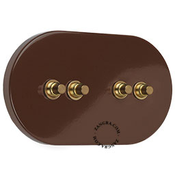 Large 4-pushbutton brass switch.