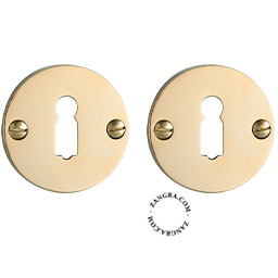 Brass keyhole covers.