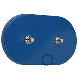 interrupteur avec deux boutons-poussoirs en laiton nickele sur socle en acier bleu