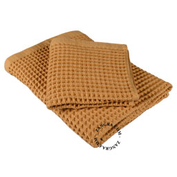 Yellow waffle cotton towel.