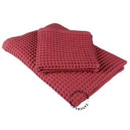 Red waffle cotton towel.