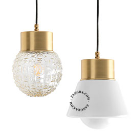 Brass pendant light with glass shade.