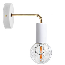 White wall light with brass arm.