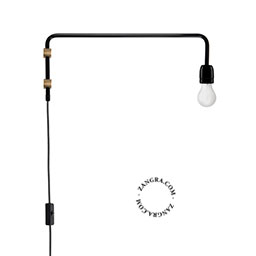 Black porcelain wall light with swing arm and plug.