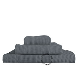 Dark grey honeycomb bath towel.
