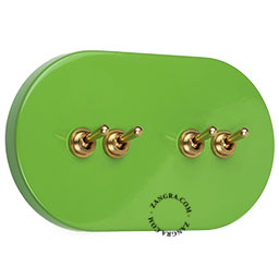 Ovale green light switch with 4 toggles.