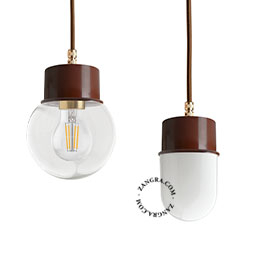 Brown pendant light with glass shade.