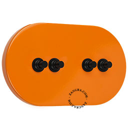 grand interrupteur orange vintage avec 4 boutons-poussoirs en laiton noir