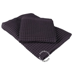 Black waffle cotton towel.