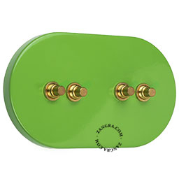 grand interrupteur vert avec 4 boutons-poussoirs en laiton brut