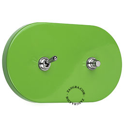 interrupteur vert avec un bouton-poussoir et un levier en laiton nickele