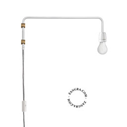 White porcelain wall light with swing arm and plug.