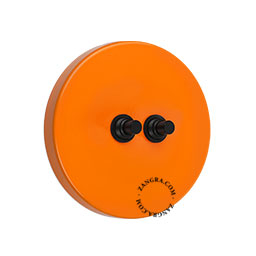 interrupteur orange avec 2 boutons-poussoirs en laiton noir