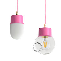 Pink pendant light with glass shade.