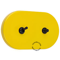 interrupteur et bouton-poussoir jaune et encastrable avec levier et bouton noirs
