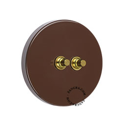 Double light switch in brown.