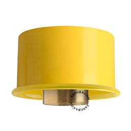 Yellow wall or ceiling light replacement base.