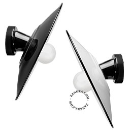 Black porcelain wall light with enamel lampshade.