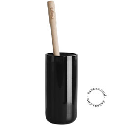 Black porcelain toilet brush holder with wooden brush.