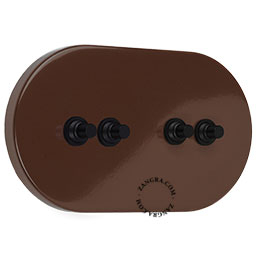 Large brown 4-pushbutton switch.