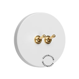 double interrupteur blanc avec 2 leviers en laiton brut couleur or