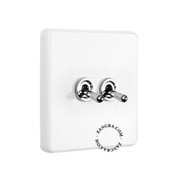 White porcelain square-shaped switch.
